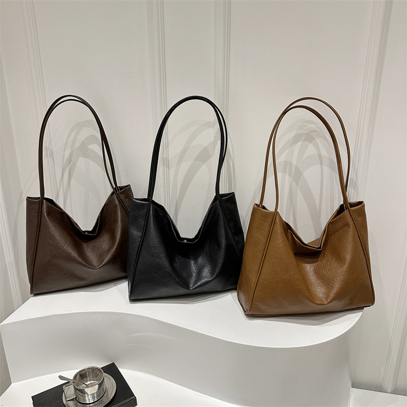 Bolsa de mano casual coreana para mujeres 2024 nueva moda de alta capacidad bolso de hombro de estilo minimalista bolso de mujer de viaje al trabajo