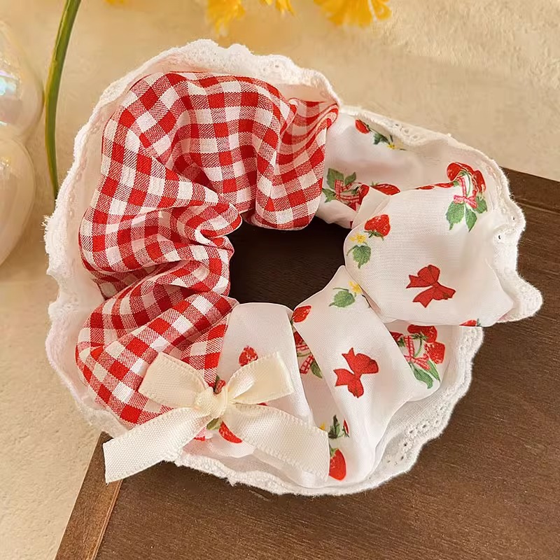 Pastoral viento intestino anillo de cabello mujer 2025 nuevo estilo de alta sensación bola de cabello cuerda de cabeza flor dulce princesa adornos de cabello cuerda