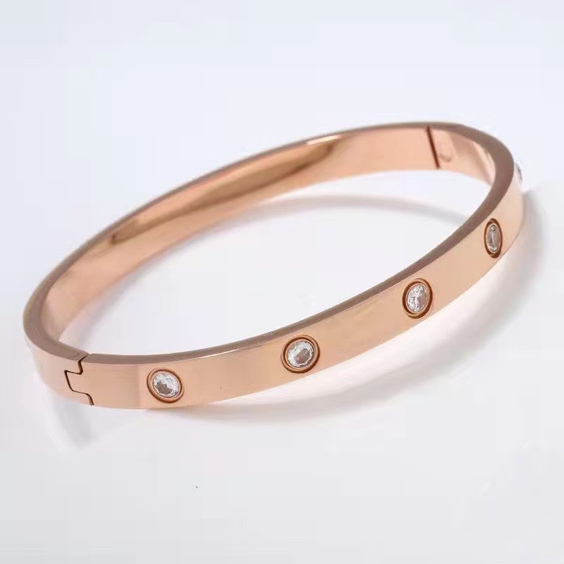 Moda transfronteriza estilo explosivo simple y generoso lujo ligero moda de alta gama con incrustaciones de 10 diamantes titanio acero para hombres y mujeres pulsera de pareja