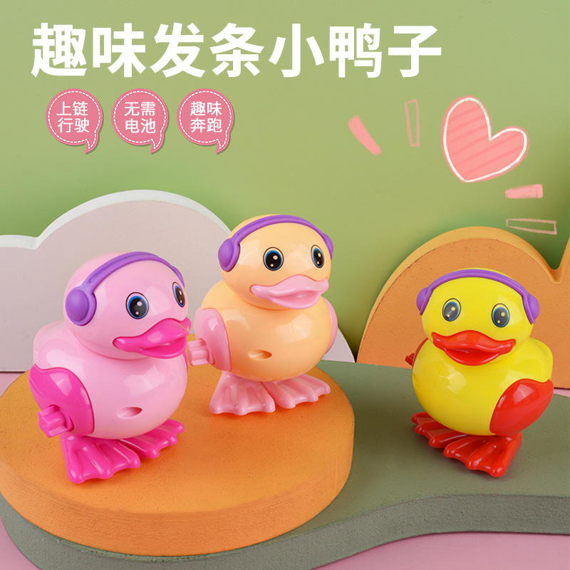 Bobinado pequeño pato reloj pequeño pato puesto buena oferta precio al por mayor pato saltando juguetes para niños al por mayor