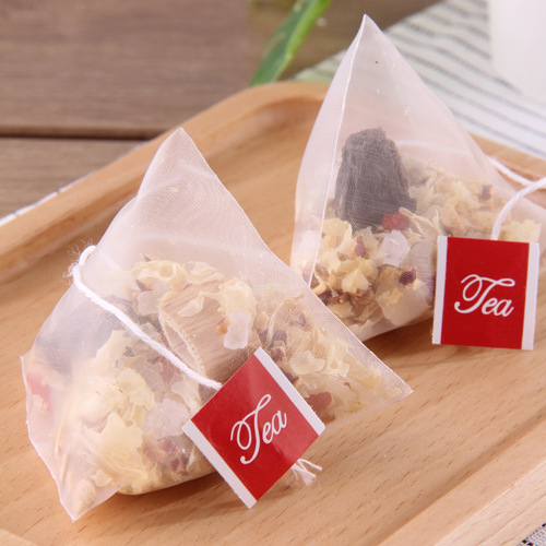 Substitute scented tea, small pear soup, affordable triangular bag, one-piece drop-shipping rock sugar, red dates, tremella, pear and diced tea bags for commercial use