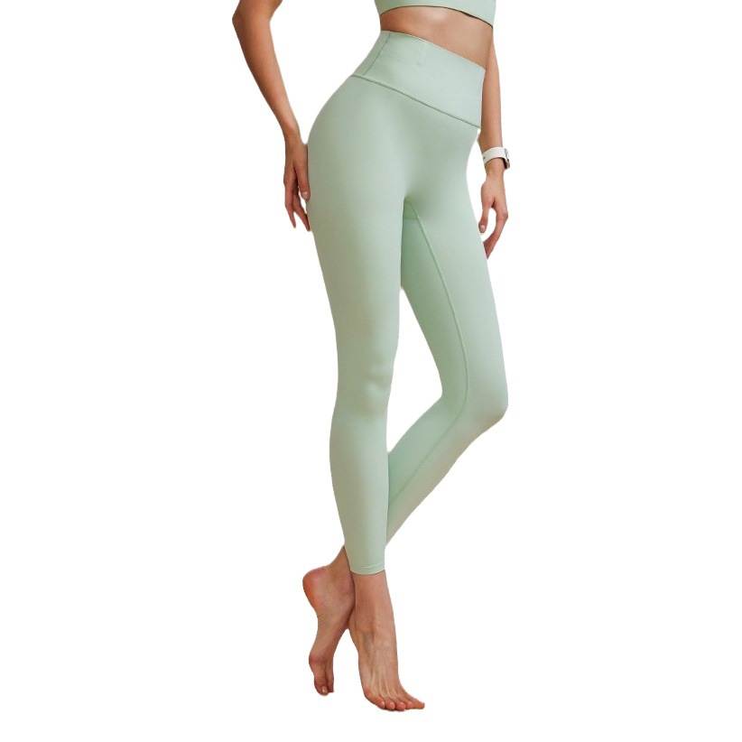 Nuevo actualizado pantalones de gelatina de silicona cintura-apretado Hip-lifting melocotón pantalones de yoga nude anti-curling deportes fitness Pantalones