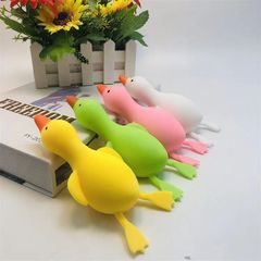Relieve stress by squeezing the duck, kneading the flour, pulling the duck, and petting the white goose. The cute and innocent yellow duck has slow rebounding and is lying down. 