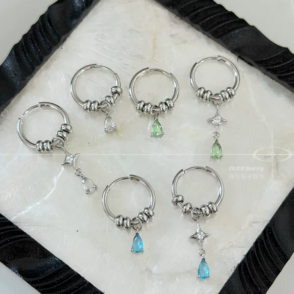 Elegant and sophisticated green teardrop-shaped four-pointed star tassel asymmetrical earrings, suitable for both pierced and non-pierced ears, with detachable design