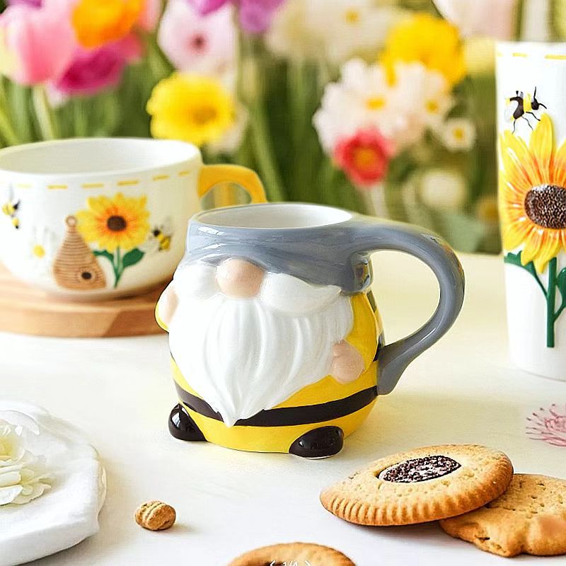Fabricantes al por mayor de cerámica girasol cubiertos diarios una variedad de diseño pintado a mano tazas tetera decoración ornamental
