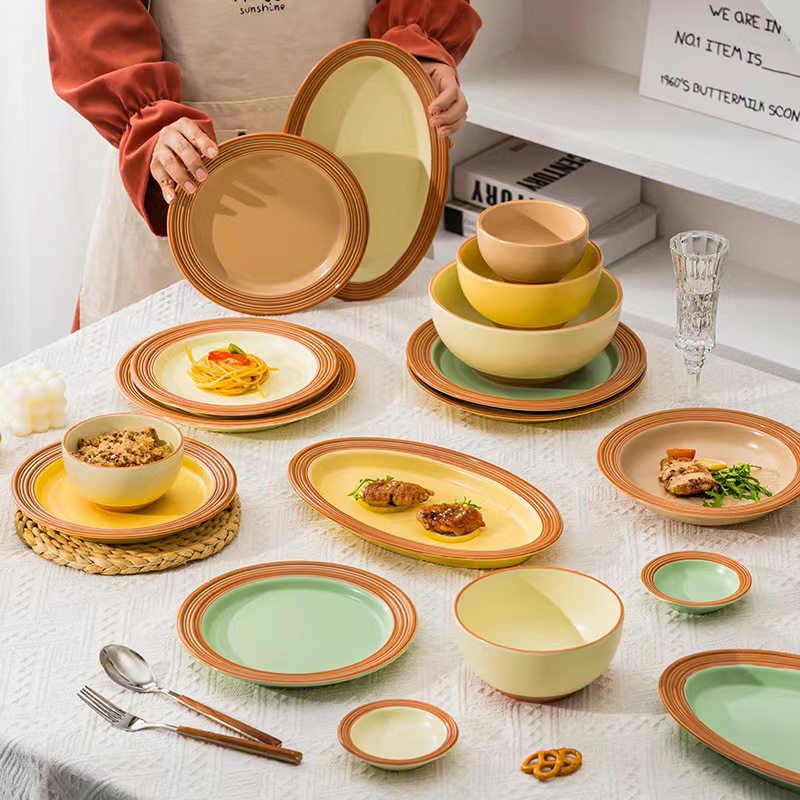 Simple cubiertos de cerámica nórdica crema doméstica platos de viento conjunto de platos de arroz anti-escaldado platos de pescado platos de platos al por mayor