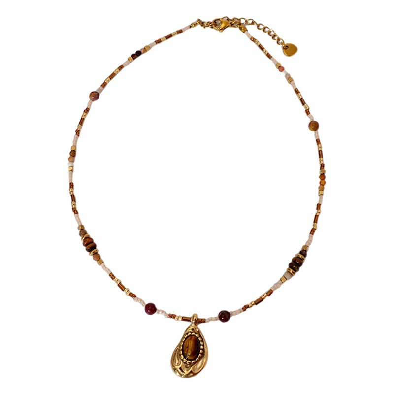Collar con cuentas de ojo de tigre Maillard Cadena de suéter de otoño e invierno de alta calidad Acero de titanio Cadena de clavícula de piedra natural retro de lujo ligero