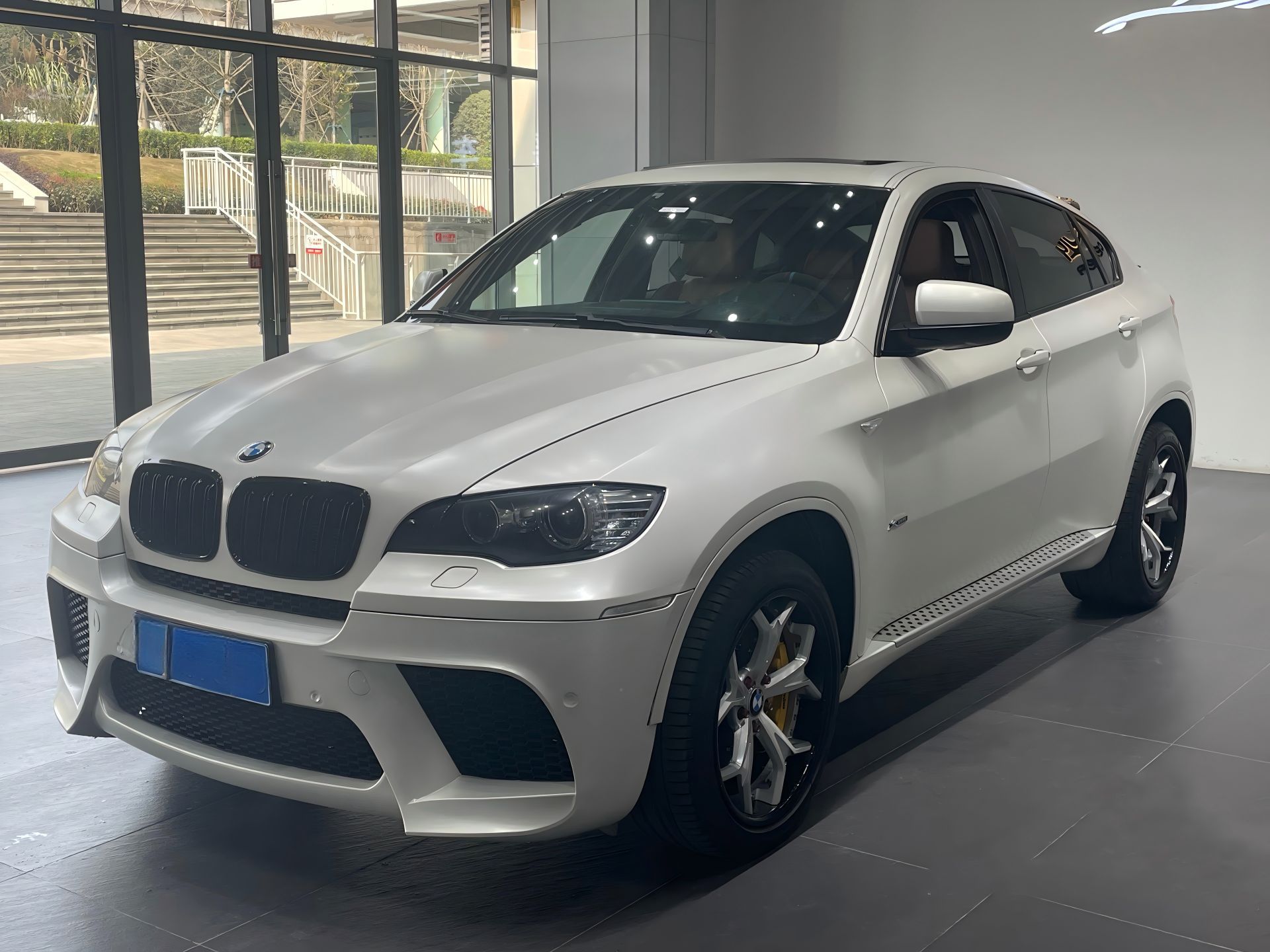 Suitable for 2008-2015 BMW X6 E71 modified to X6M front bumper and rear bumper injection molded PP modified body kit