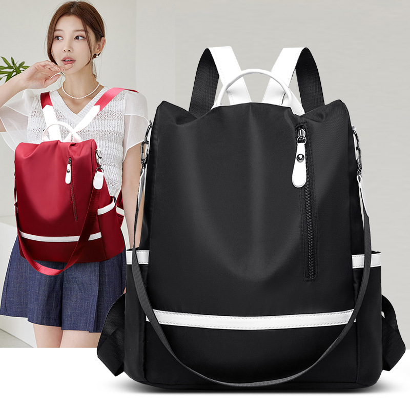 2023 nueva mochila antirrobo de nailon para mujer, color de contraste de moda, mochila de viaje de doble uso de gran capacidad, mochila escolar al por mayor
