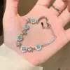 Серебристый, Зелёный