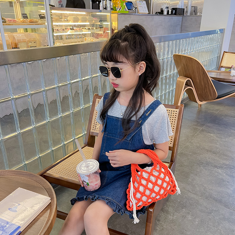 Bolsa de red de pesca para niños de estilo coreano 2022 otoño nuevo comercio exterior bolsa tejida personalizada niños y niñas bolsa de cubo hueco portátil