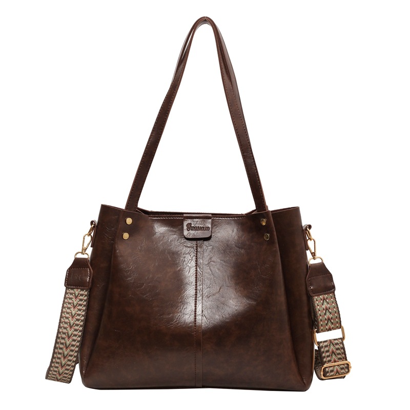 European and American retro large-capacity commuter tote bag 2024 new portable shoulder bag, textured wide shoulder strap messenger bag_voghion.com