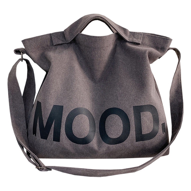 Carta de color sólido impreso lienzo bolsa grande de los hombres de moda bolsa de mensajero del hombro bolsa de gran capacidad se puede enviar en nombre