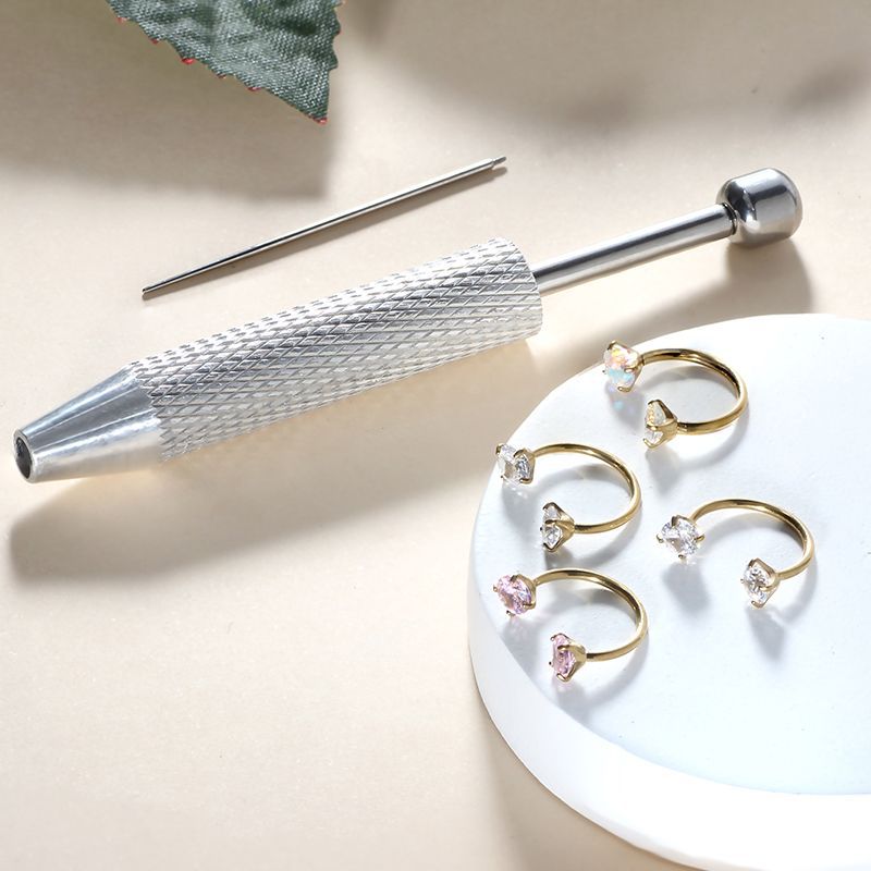 Silver pointed spike labret stud material detail