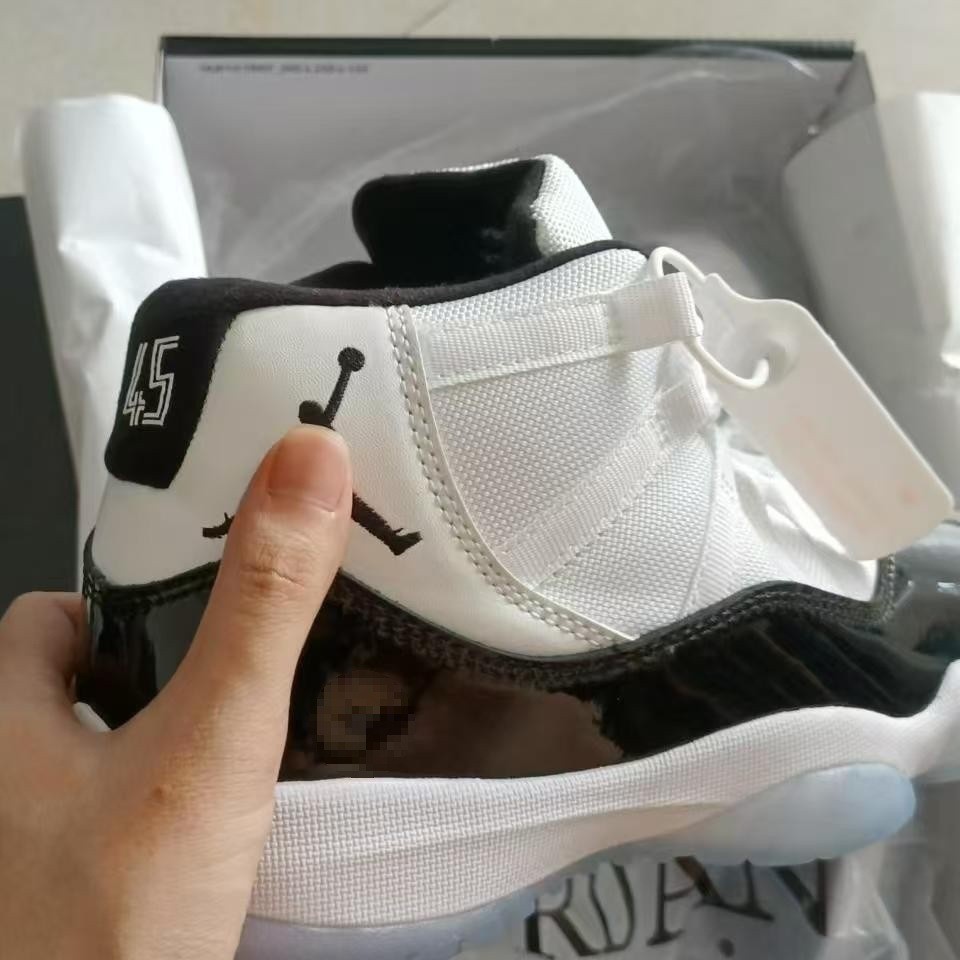 1: 1 original en el extranjero Jordan AJ11 verdadero cojín de carbono con amortiguación inferior 48.5 zapatillas de baloncesto masculinas y femeninas image 1