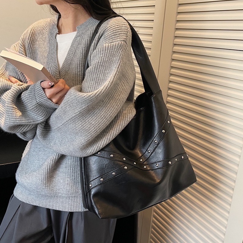 Transfronterizos retro nicho bolsas de cubo portátiles 2025 nuevo transporte de gran capacidad bolsa bolsa de hombro de locomotora