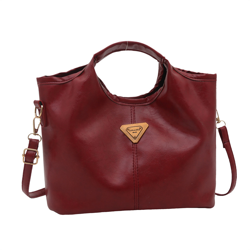 Bolso de mano retrógrado nicho mujer 2025 nuevo estilo de piel de cera de aceite para viajar bolso de hombro de gran capacidad relajado mochila