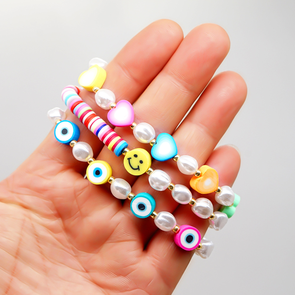 Fashion New Bohemian Polymer Clay Imitation Pearl Devil's Eye Bracelet Set display picture 1