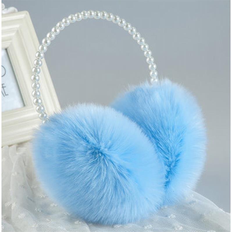 Nueva caliente lindo orejeras de felpa de invierno caliente a prueba de frío fábrica al por mayor de piel de conejo orejeras piel