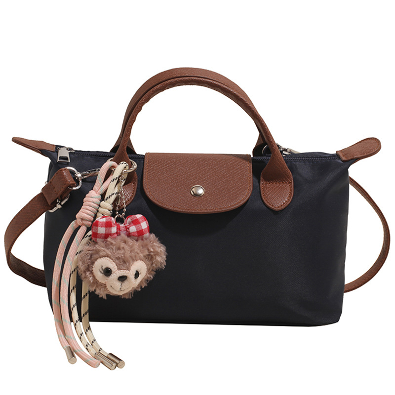 Bolsa de mano francesa de nicho Zhonglong para mujeres 2025 nuevo paquete de hombro casual universal para viajar bolso de alta calidad