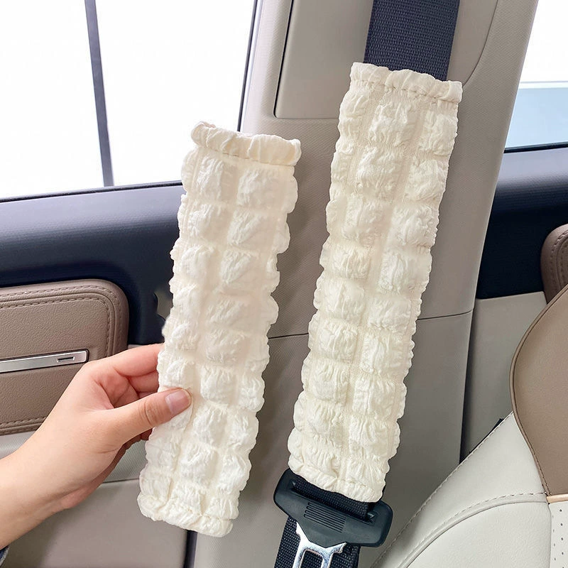 Оболочка плеча автомобильного ремня безопасности может быть обработана