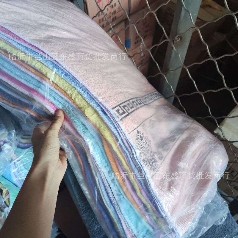 Handling large towels Household handling large towels Handling large towels Household handling large towels