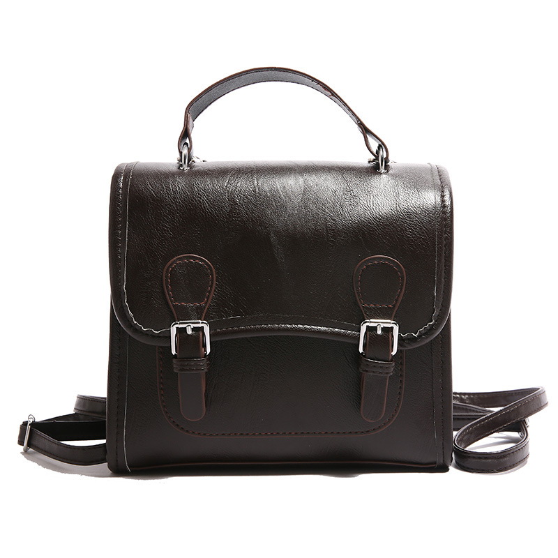 Colegio retro coreano doble hebilla estilo británico 2024 literatura y arte ocio de gran capacidad de moda textura mochila de hombro