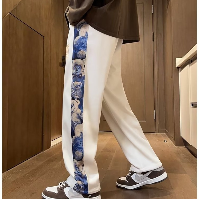 Pantalones de oso de marea nacional de primavera y otoño de los hombres marca de moda recta suelta pierna ancha 2025 nueva tendencia pantalones casuales de todo fósforo