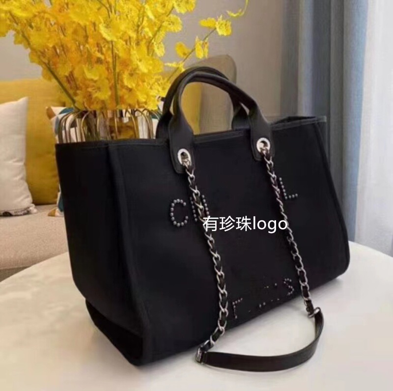 C home Xiangjia 2021 new women's bag pearl embroidery beach bag shoulder bag handbag generation hair