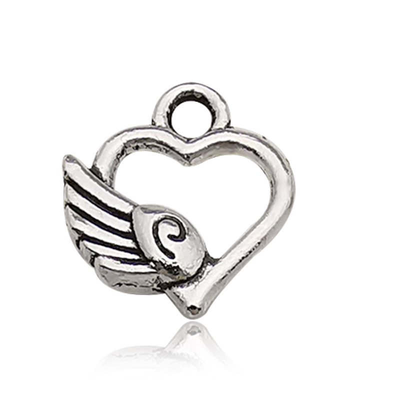 Accesorios de la joyería DIY 1 aleación de zinc accesorios en forma de corazón de plata antigua al azar accesorios de ala mixta suministro directo de fábrica