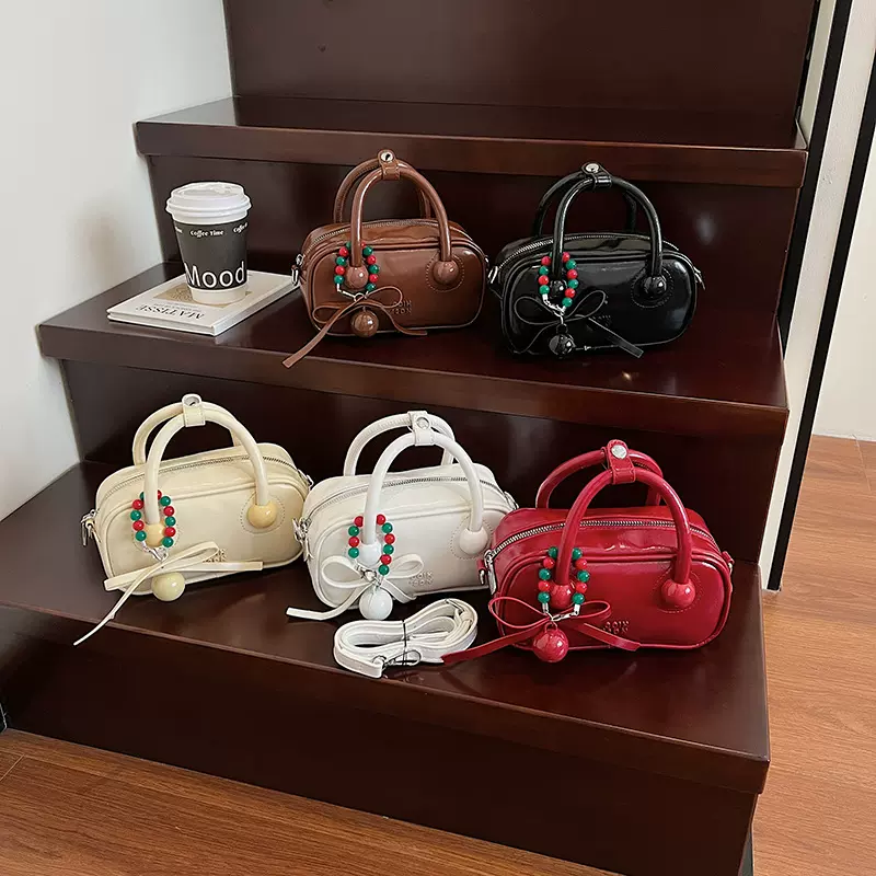 高颜值时尚手提枕头包女2025夏季新款洋气小众简约纯色单肩斜挎包