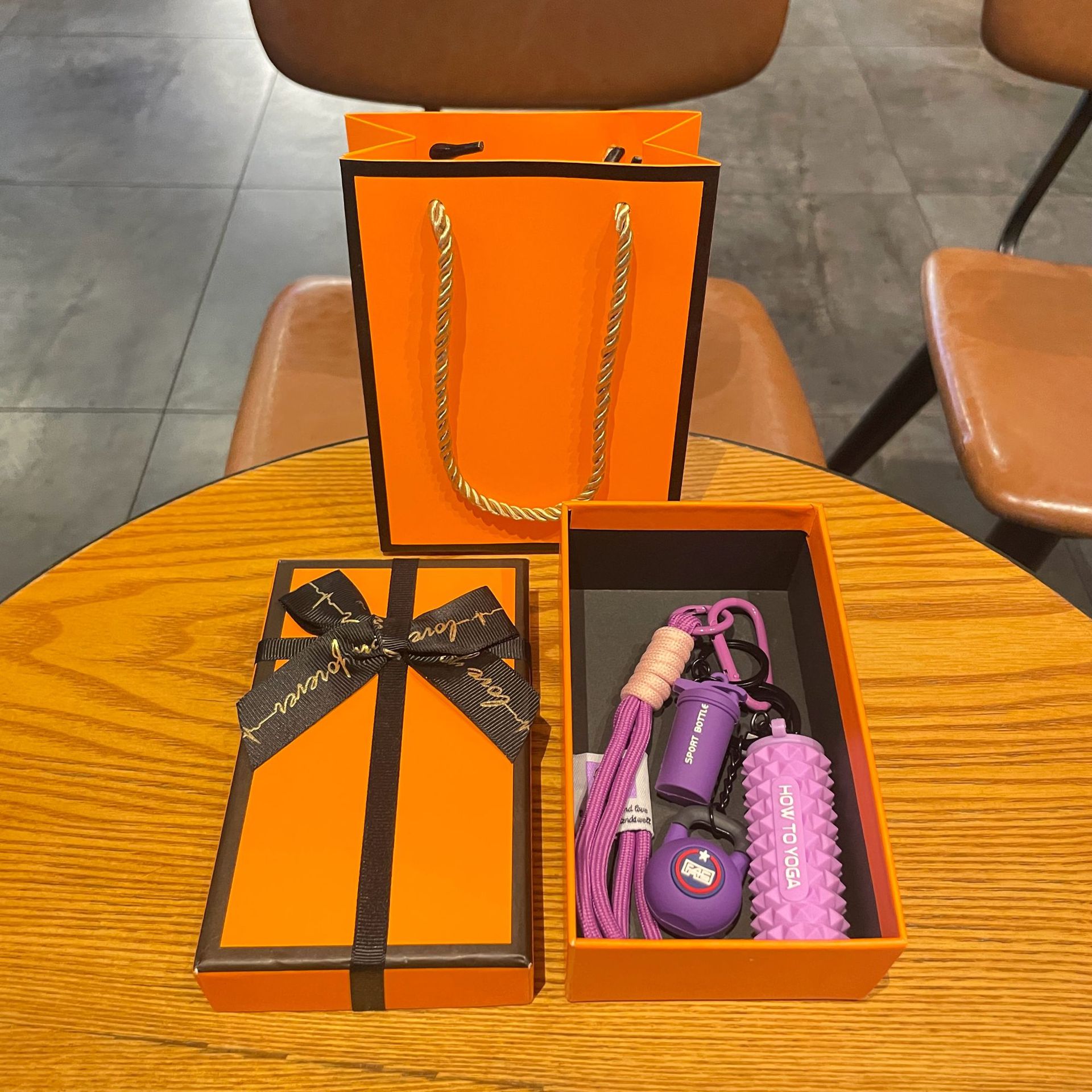 Purple set for yoga from foam, orange gift box