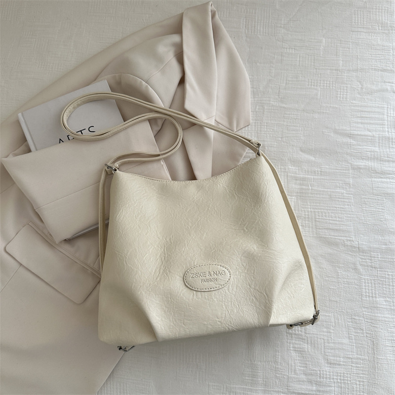 Gran capacidad de transporte popular ocio 2024 retro nuevo estilo de tendencia de color sólido multifuncional bolso de hombro para mujer