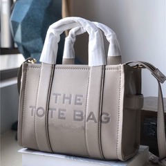 MJ同タイプの小馬哥レイシ紋牛革の特包シングル肩手提げ女性カバンのブリーフケースは欧米の時に斜めにまたがっています。