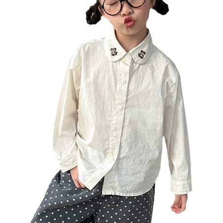 Zuo Xiaoran ropa para niños 2024 ropa de primavera camisa para niños solapa de manga larga Oso de dibujos animados bordado camisa blanca
