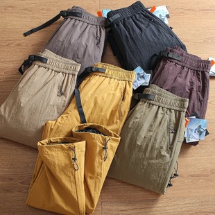The same heavy cold pants! Wind and water! Winter Outdoor Thickened Warm Down Pants Couple Duck Down Worker