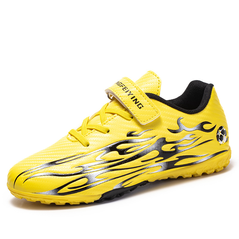 2025 nuevos niños y niñas transfronterizos zapatos de entrenamiento de clavos zapatos de fútbol estudiantes zapatos de fútbol de desgaste fábrica directa