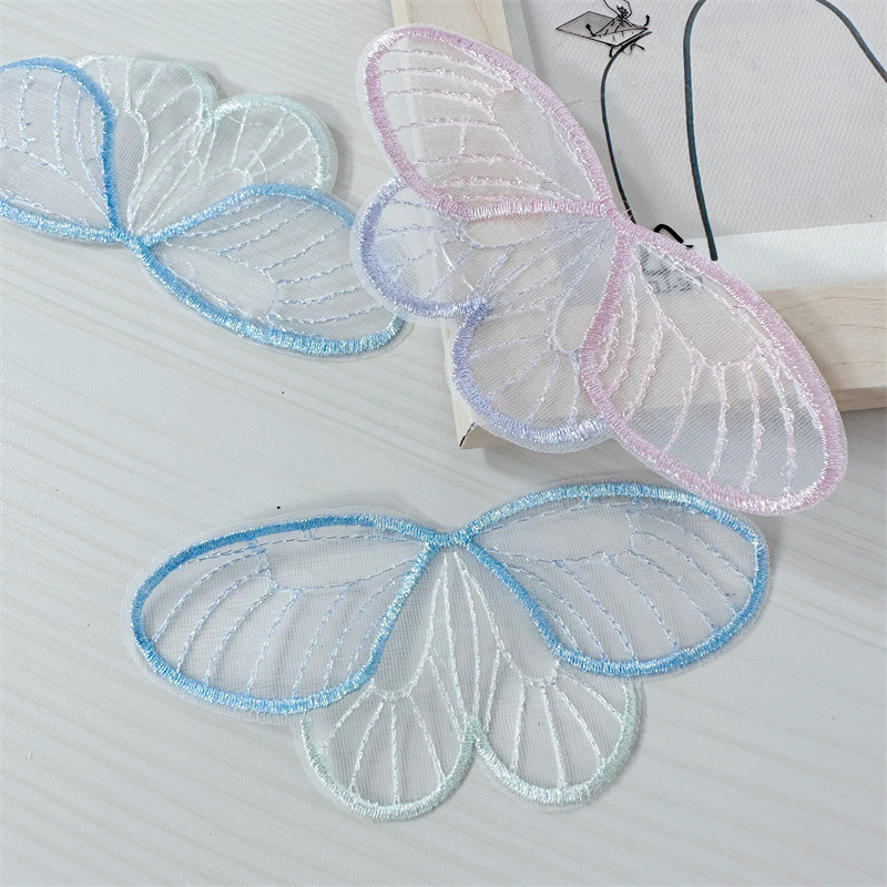 メーカー直売の薄紗レースの蝶の羽のアクセサリーのアクセサリーの頭飾りの服の網の刺繍の布は装飾の補助材料を貼ります。|undefined
