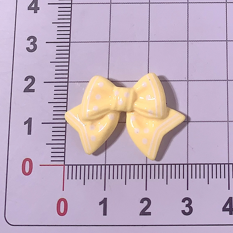 Cartoon brillante color con puntos arco corbata clip de cabello cuerda clip de cabello pegamento de crema DIY accesorios de resina de hebilla