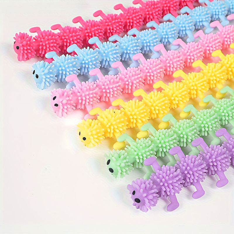 Juguetes extraños transfronterizos TPR pegamento suave descarga juguetes de reducción de presión unicornio oruga pulsera la-la - la