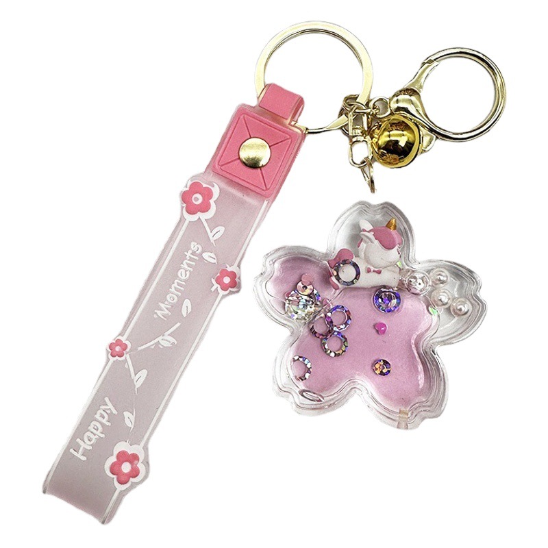 Púrpura estrella de cinco puntas líquido Quicksand llavero chica corazón flor de cerezo aceite colgante lindo tridimensional mochila adornos para mujeres