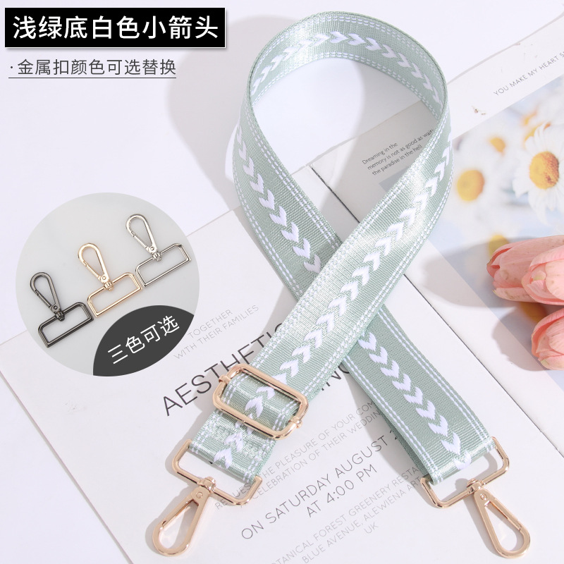 Small white arrow on light green background