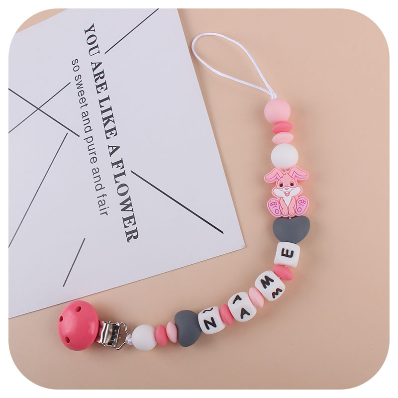 El Comercio exterior nueva cadena de chupete de conejo de silicona suministros para bebés personalizable nombre del bebé cadena anti-caída
