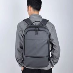 卸売りの新型ファッションは簡単です。男性大容量旅行リュックサックは水をかけないで減圧して拡張します。