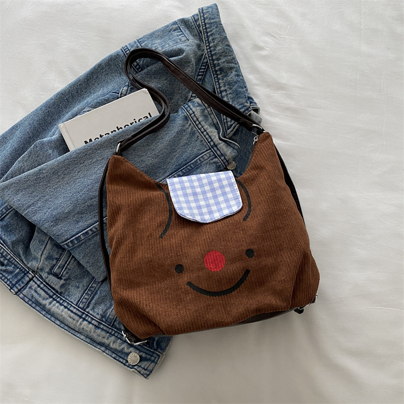 Vintage velcro nariz roja sonriente bolso de mano para mujeres otoño y invierno 2024 gran capacidad mochila de viaje mochila