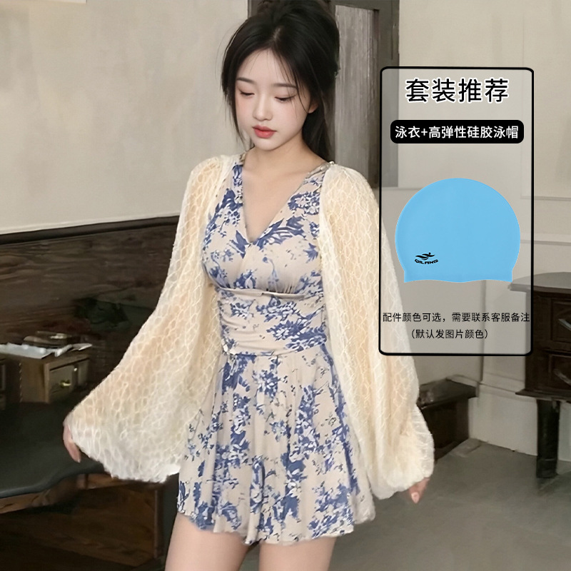 2025 nuevo estilo de manga larga protector solar falda de una pieza traje de baño con blusa de vacaciones de aguas termales traje de baño de alta gama mujeres al por mayor