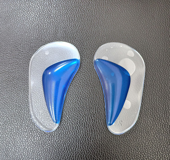 Almohadilla para arco de hombres y mujeres masaje de corrección de pie plano almohadilla de pie de silicona suave soporte de arco pie almohadilla de soporte de arco cardíaco