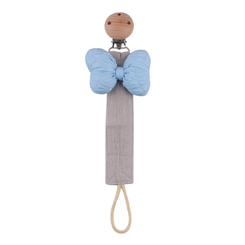 Nuevos productos para bebés clip de chupete de haya arco de dibujos animados cinta de satén de algodón y lino cuerda de chupete cadena de chupete de bebé