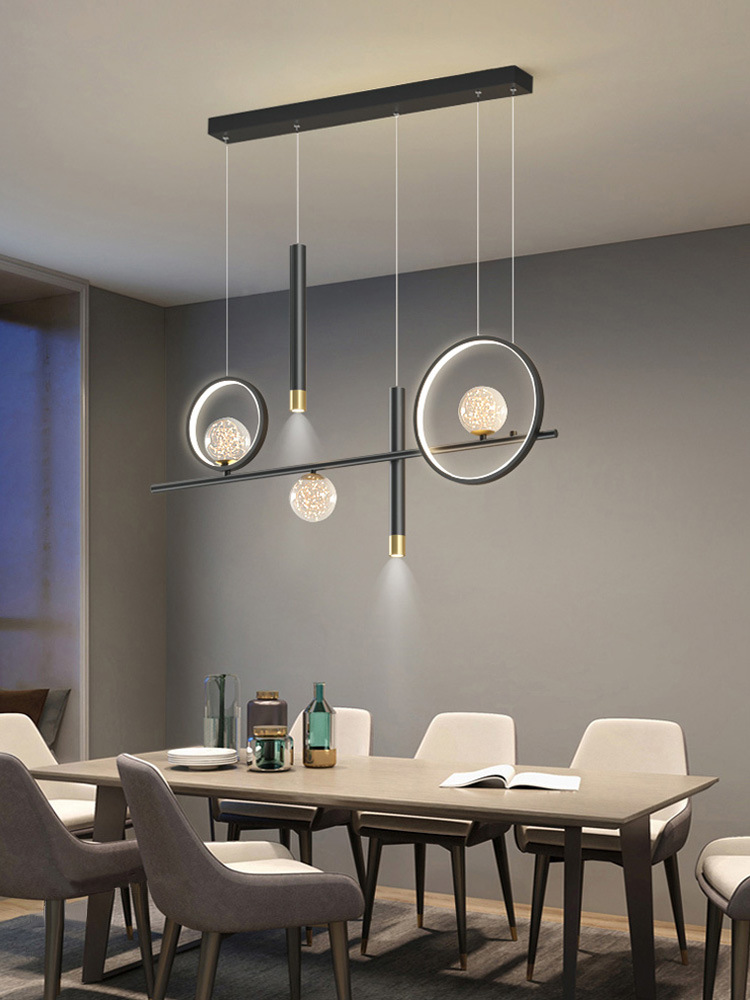 Chandelier de comedor moderno y simple 2024 nuevo bar doméstico de estilo pequeño mesa de comedor creativa minimalista lámpara de tira larga