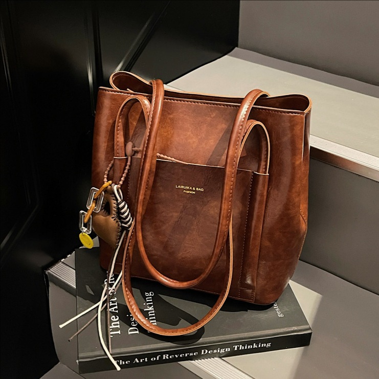 2025 nuevo bolso de mujer de cuero suave de gran capacidad bolso retrógrado bolso de mano para trabajar bolso de hombro bolso de cubo de mano